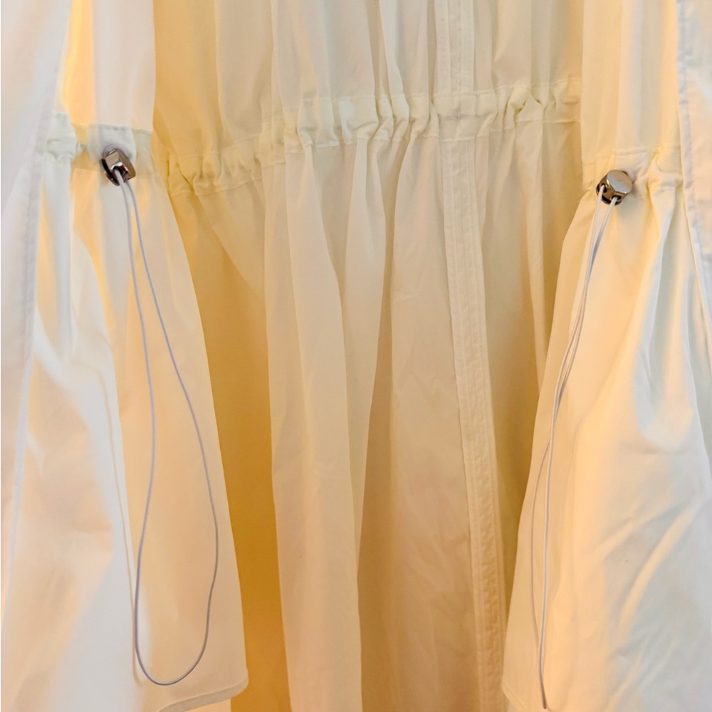 ATHLETA long, lightweight, white hooded windbreaker rain jacket. Elastic waist. - Picture 5 of 10